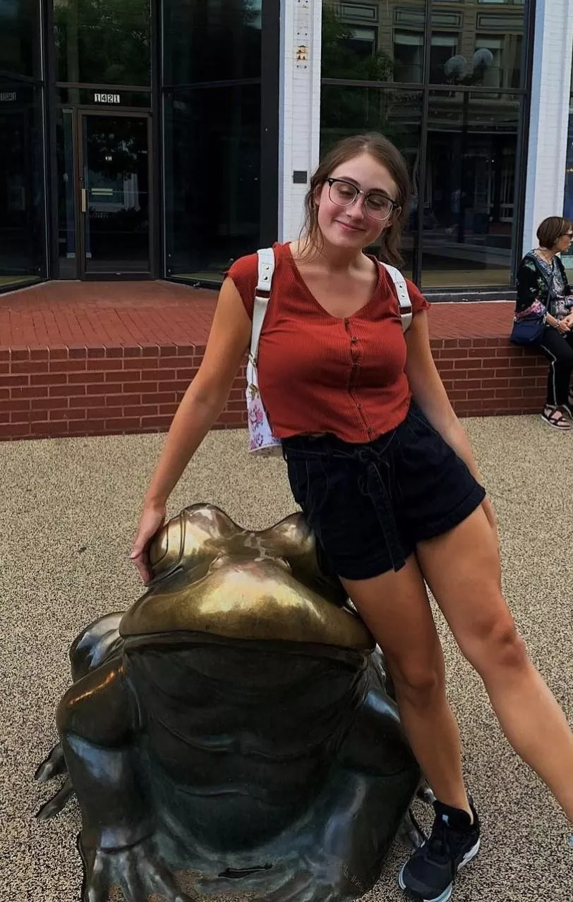 Bra lines under a red top, glasses beauty as a bonus