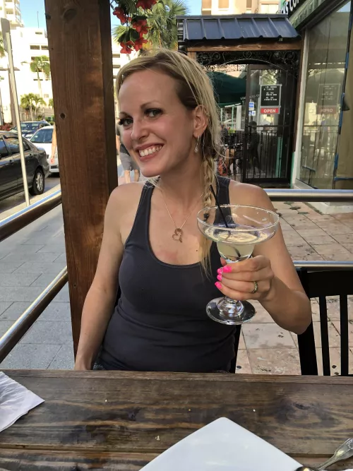 Cup outline beneath a black tank top <3