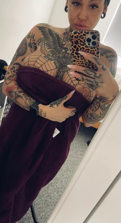 Which tattoo do you see first