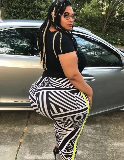 Curvaceous mixed cutie with braided long hair