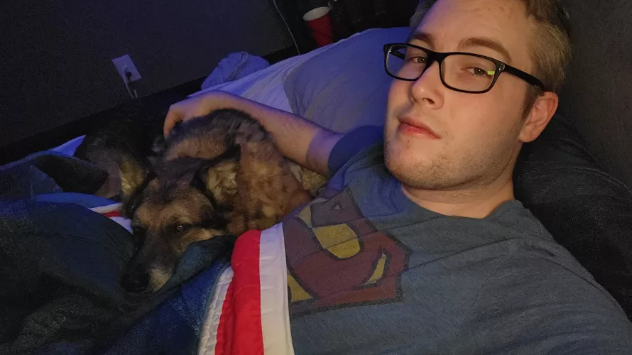 He loves his cuddles... Plenty of room for someone else to join us