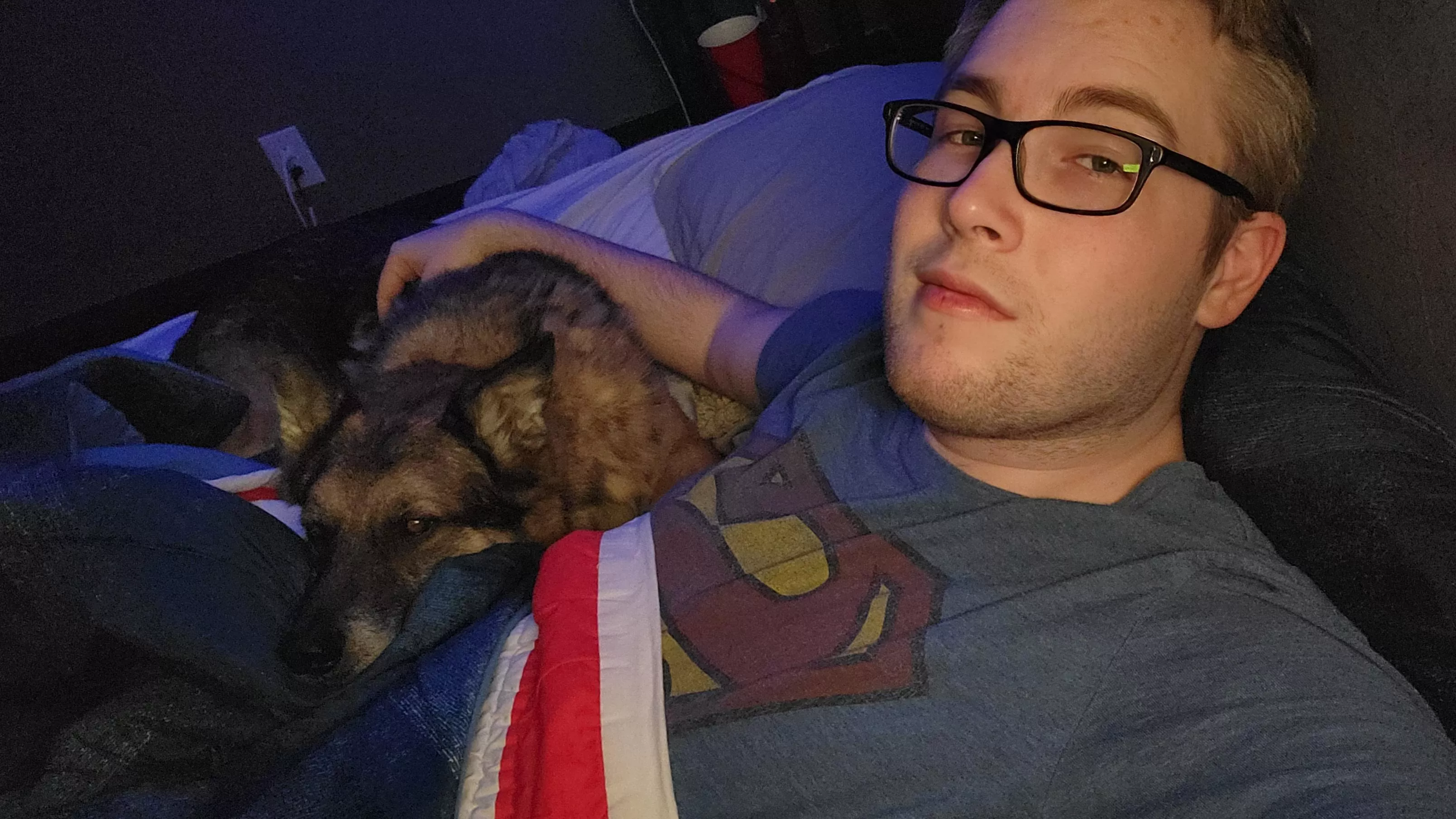 He loves his cuddles... Plenty of room for someone else to join us