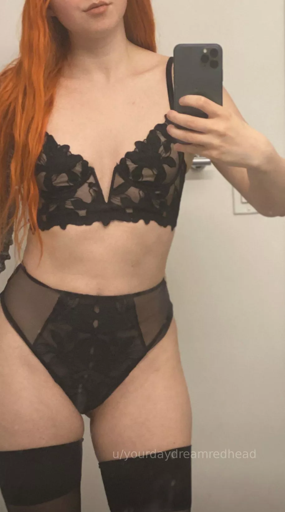The black lace contrasts with my long red mermaid hair