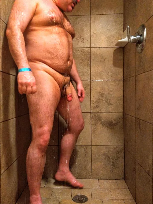 There's room in the gym shower for two, if you kneel down