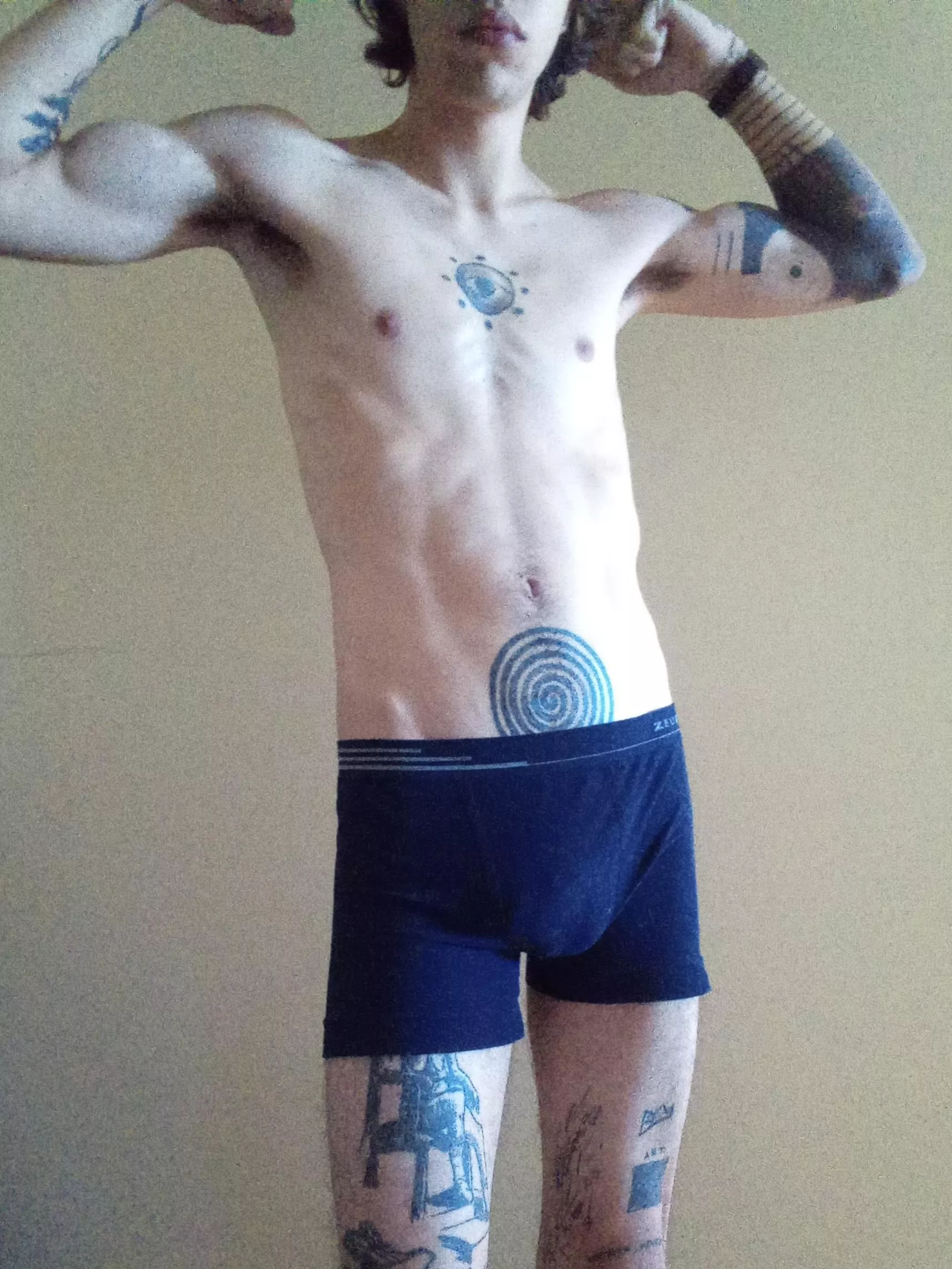 skinny tattooed boy