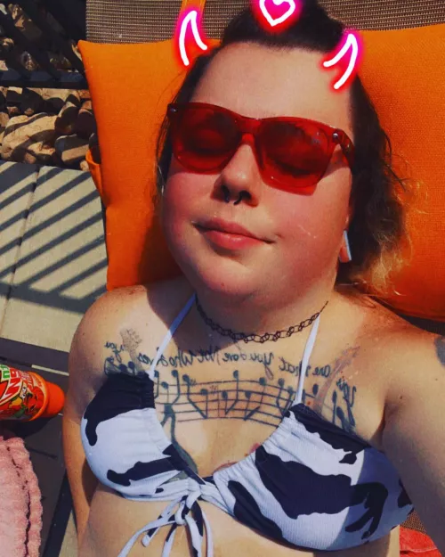 Trans cow by the pool