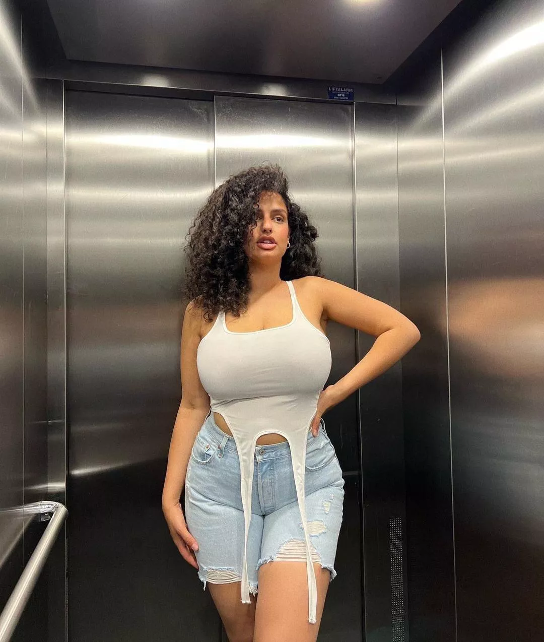 Danger: You can get stuck in the elevator with her