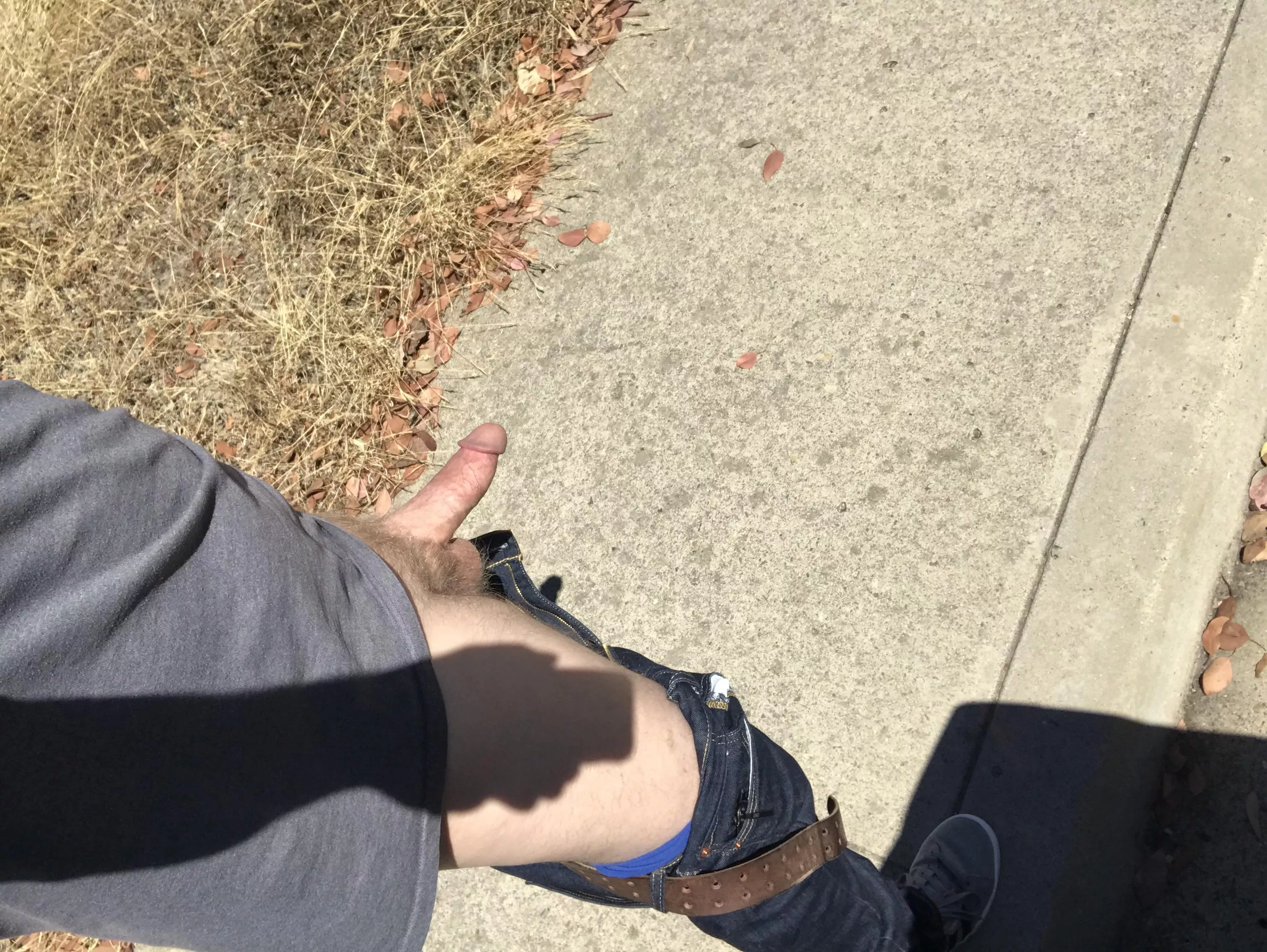 Stepped outside of car on busy road