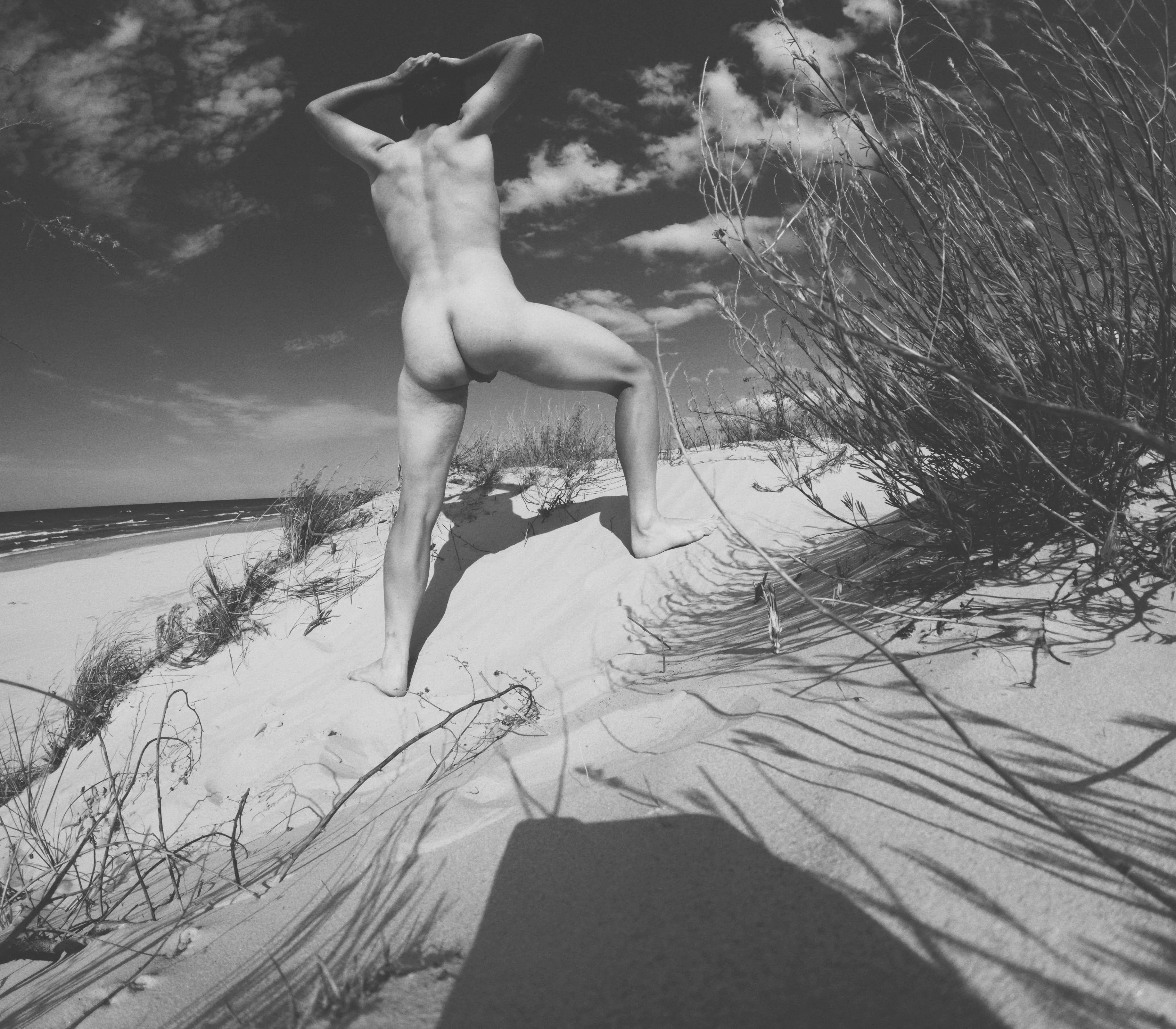 Stretching on the beach (m)