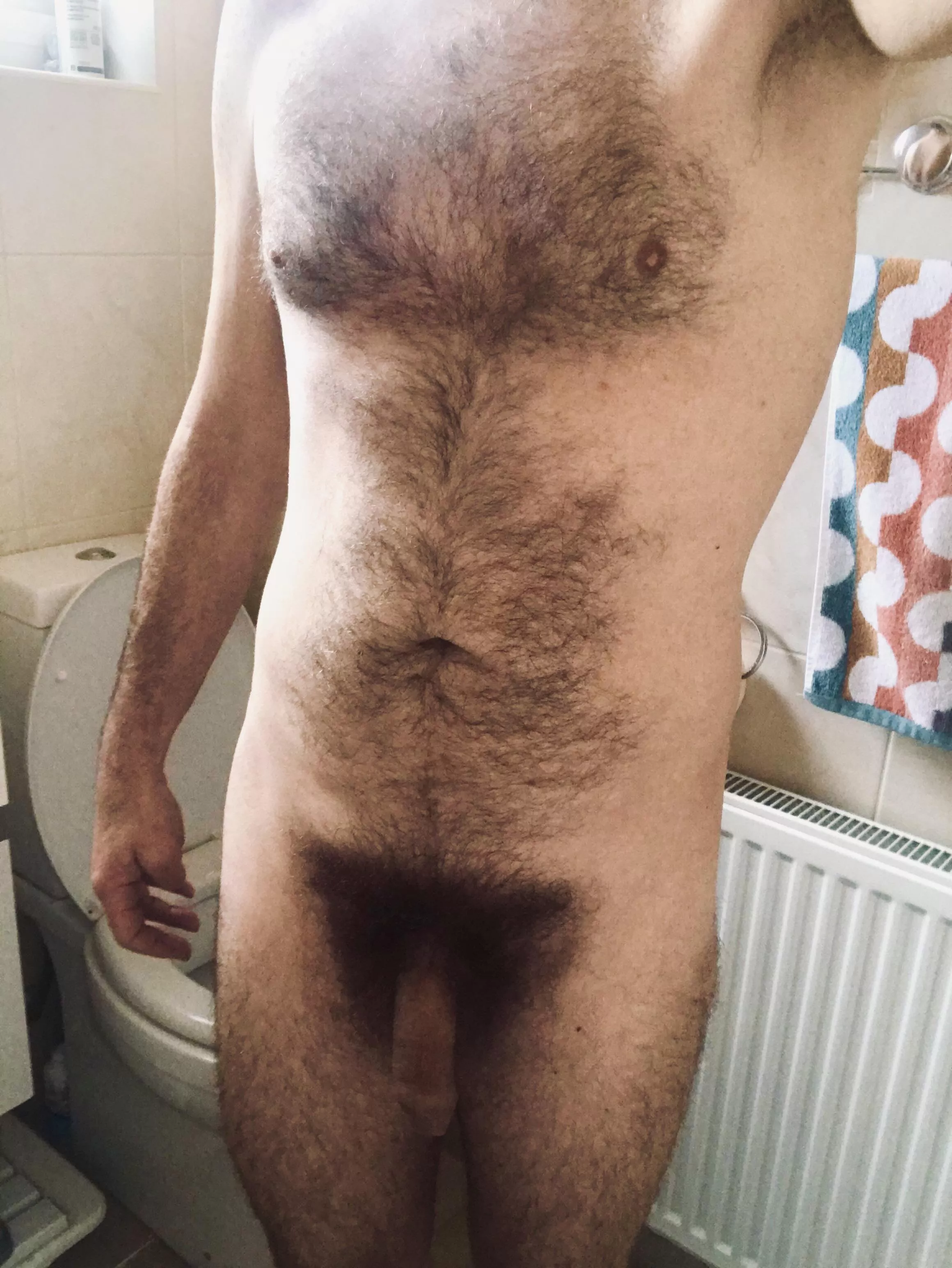 My thick bushes pubes almost cover my balls.