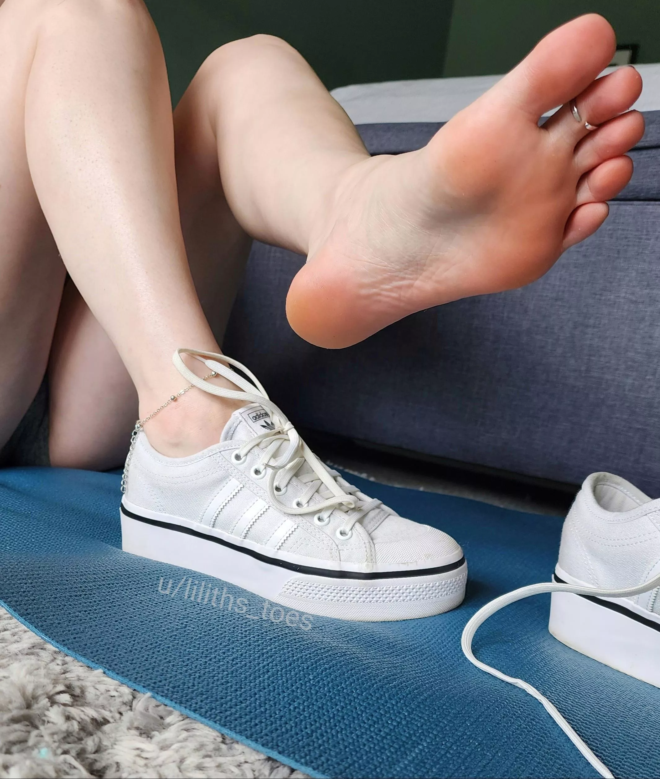 Peeling off my sneakers after running errands all day.