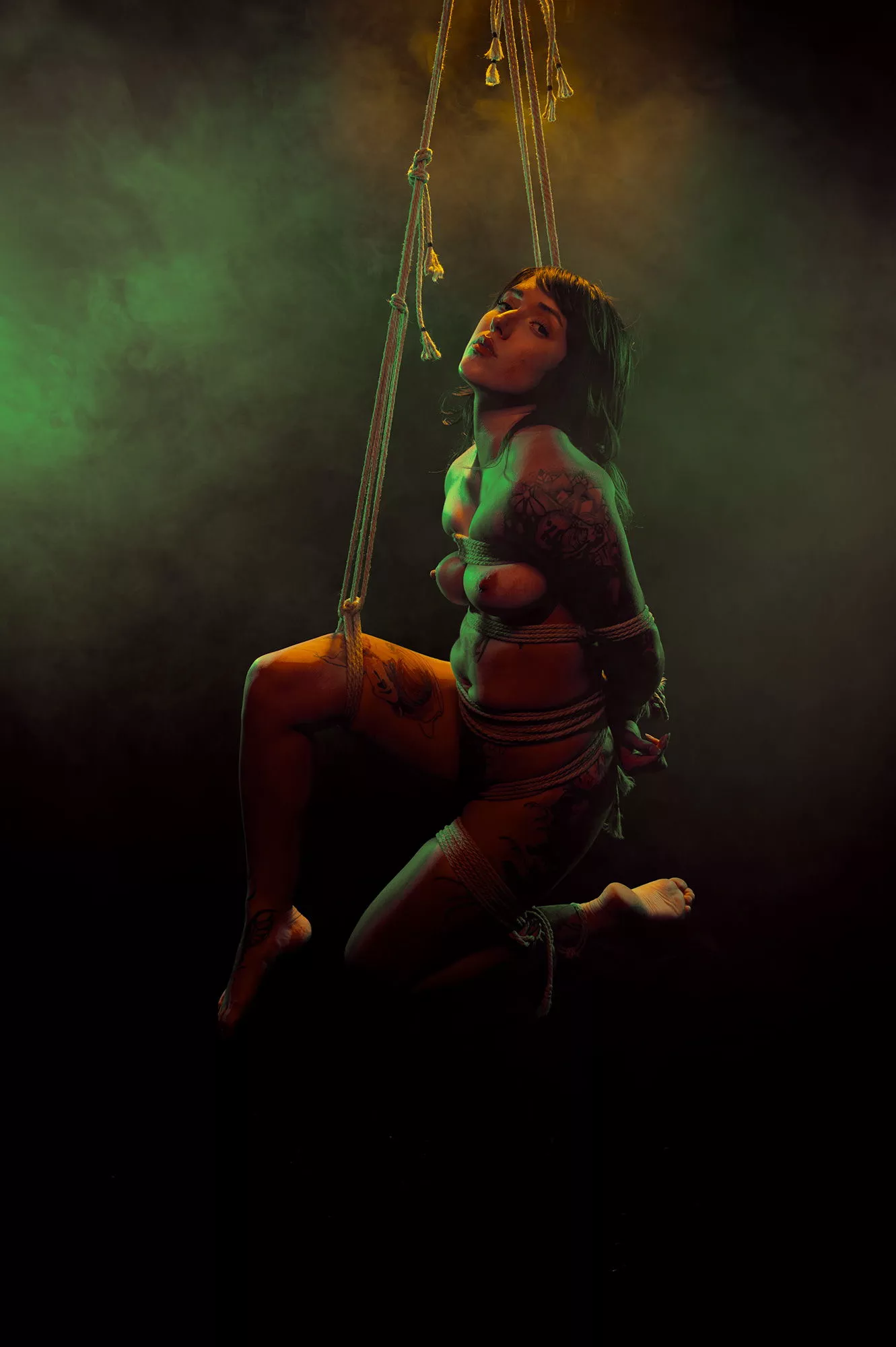 Carolyn Jean suspended in the smoke - rope and photo by me (The Dark Arts)