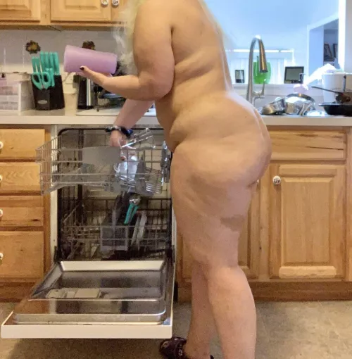 Cleaning the kitchen.
