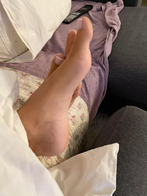 Do you think I can grab the remote with my toes?