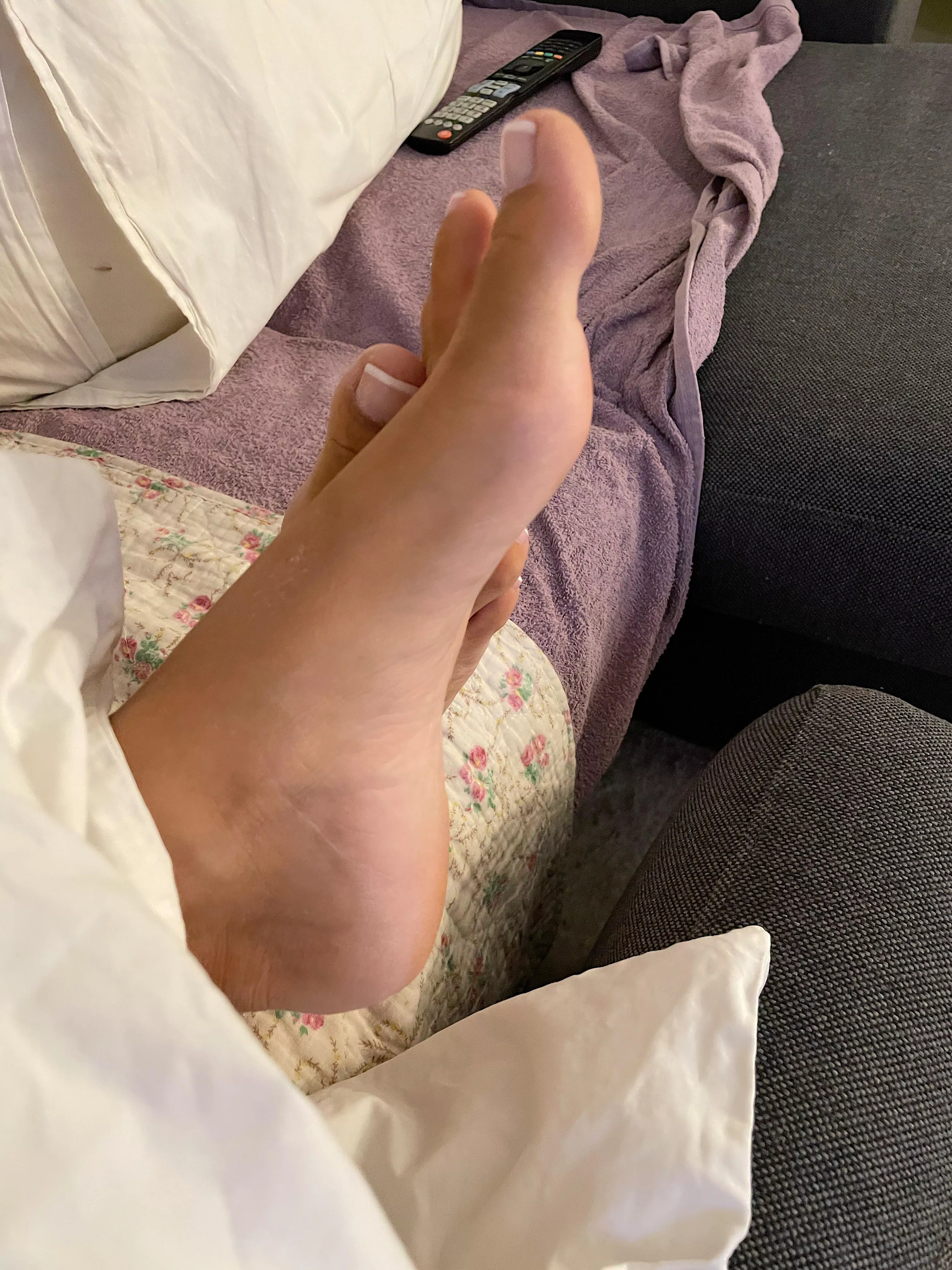 Do you think I can grab the remote with my toes?