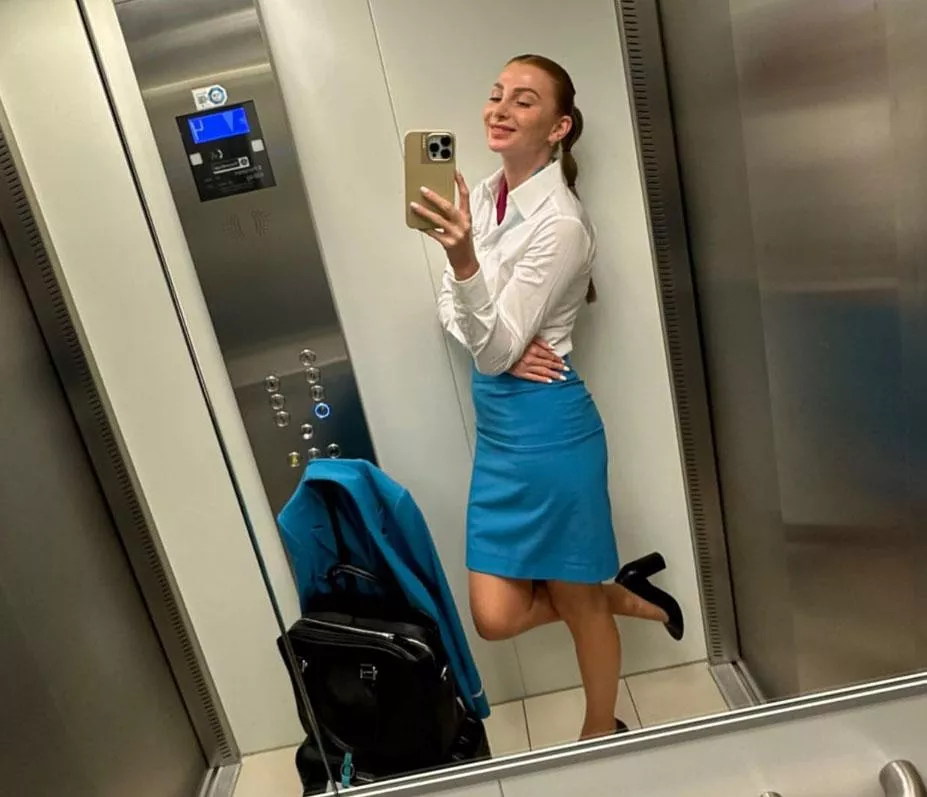 hot flight attendant on the way to work