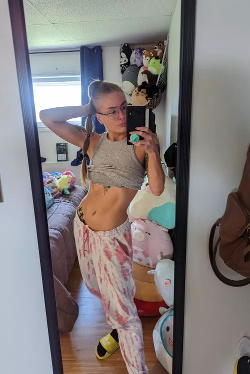 Cozied up, flaunting my abs, in a sea of plushies. A cozy peek at my obsession. (@RoraPickle)