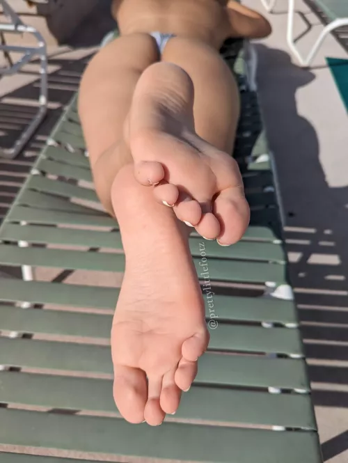 Top less in my tiny bikini bottom with my feet up… risky, but id like to see what you’d do? 😈