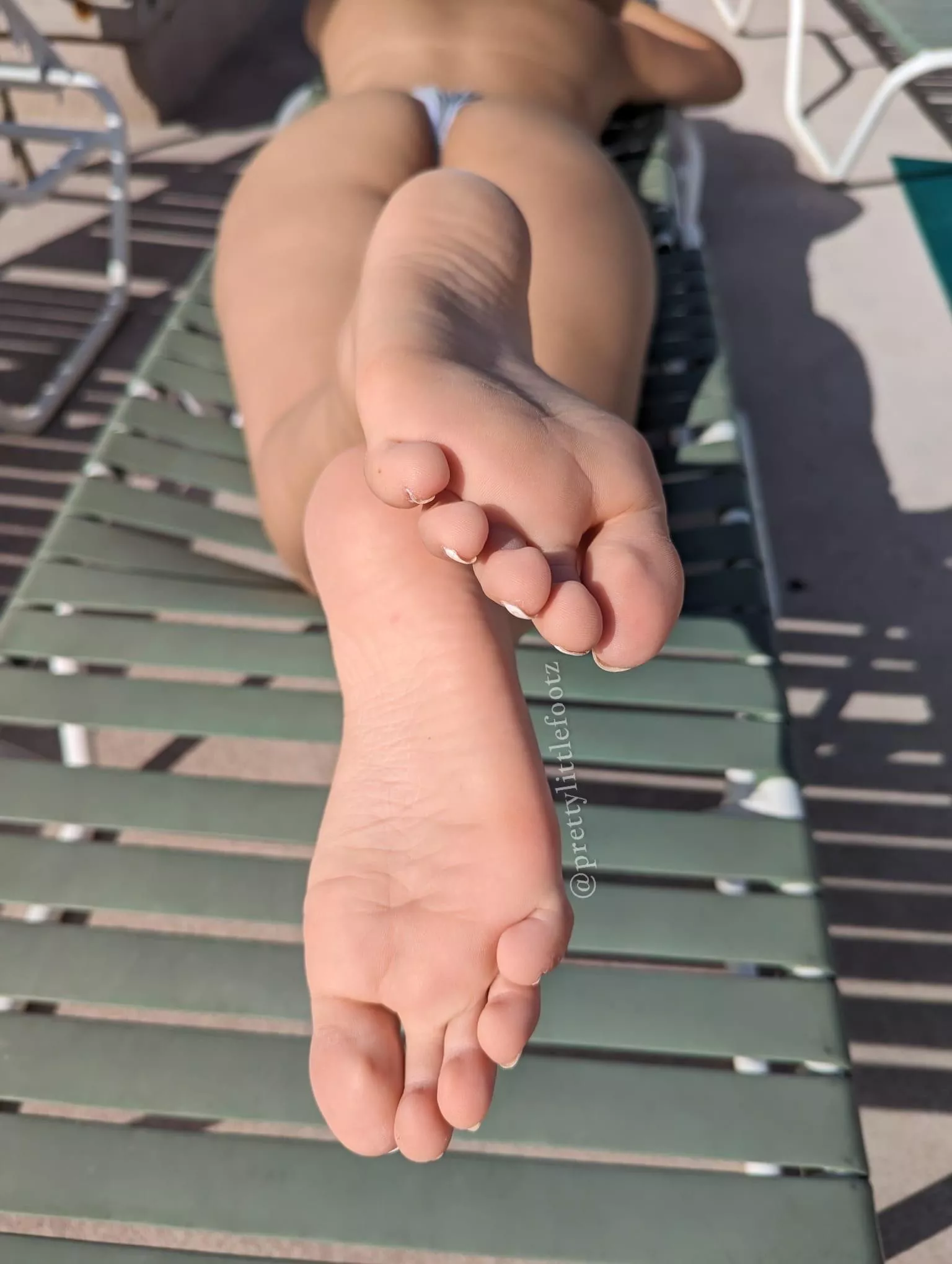 Top less in my tiny bikini bottom with my feet up… risky, but id like to see what you’d do? 😈