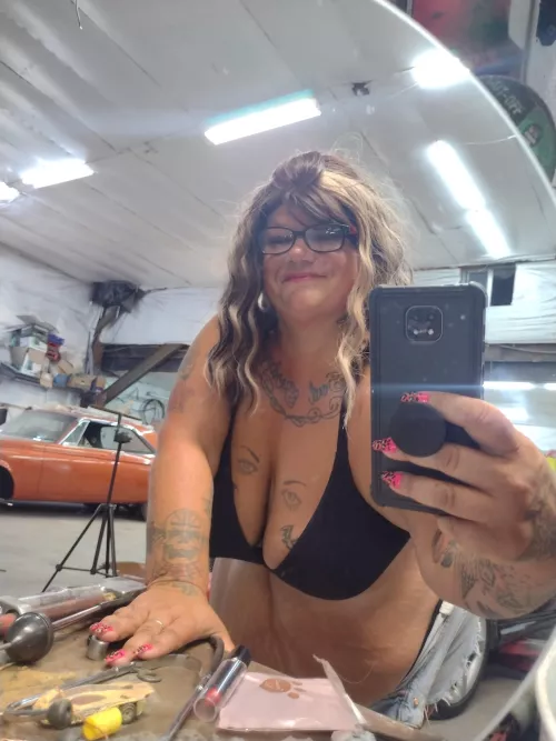 Checking my grin after I touched up my lip stick