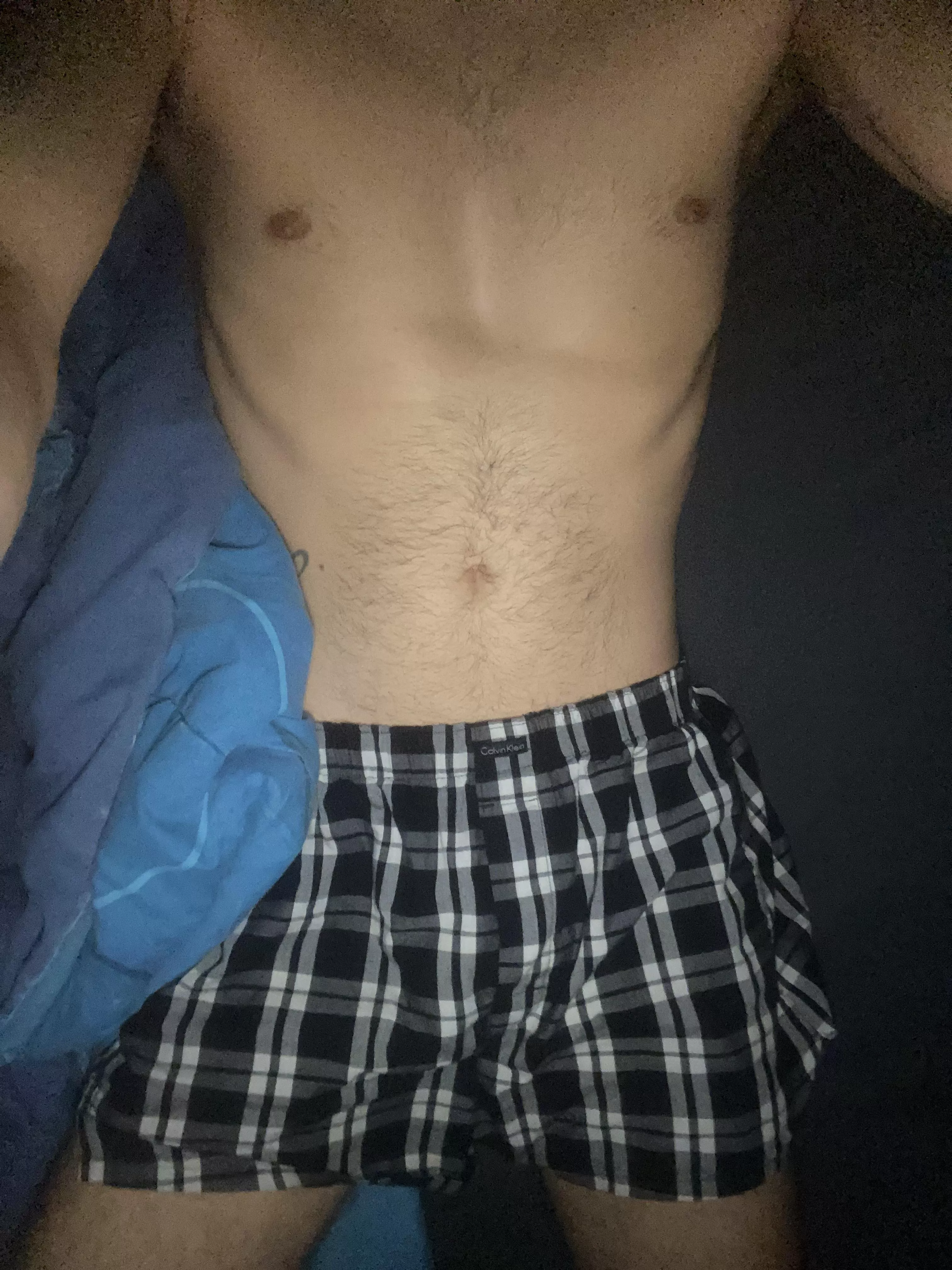 laying in bed in my boxers
