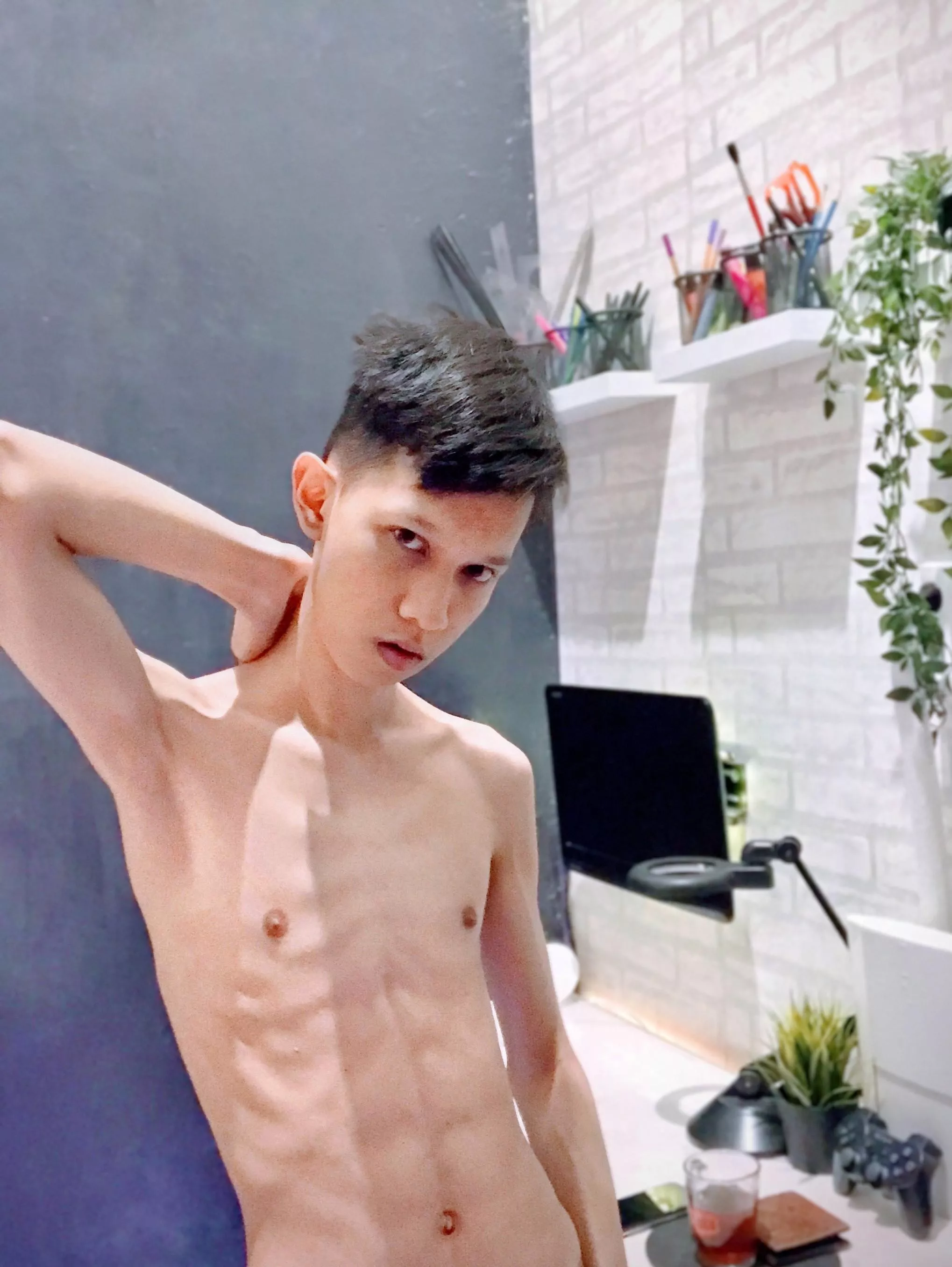 Young skinny Asian twink with abs