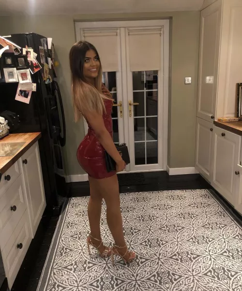 Tight dress showing off that huge arse