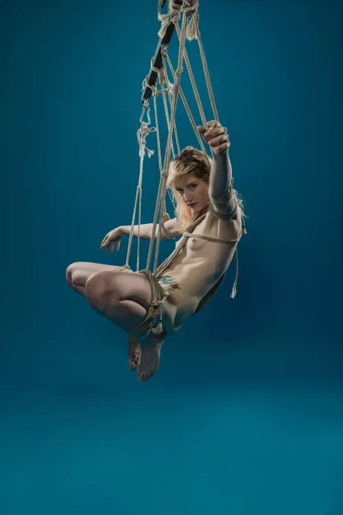Diana Oliphant suspended on blue - rope and photo by me (The Dark Arts)