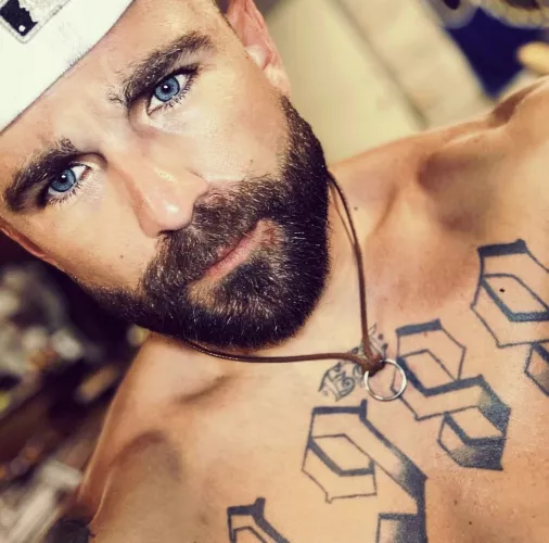 I'm just a horny guy with tattoos :)