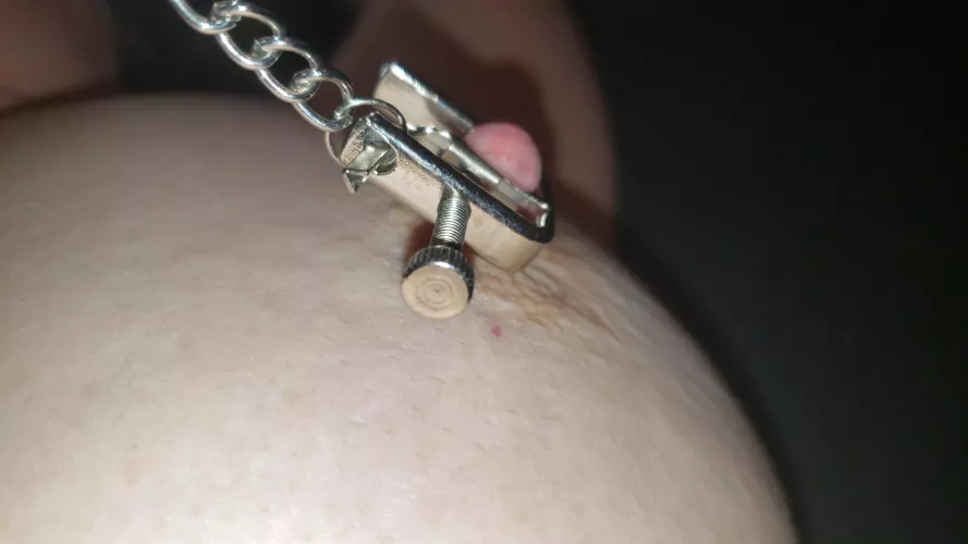 Clamped nipple tug