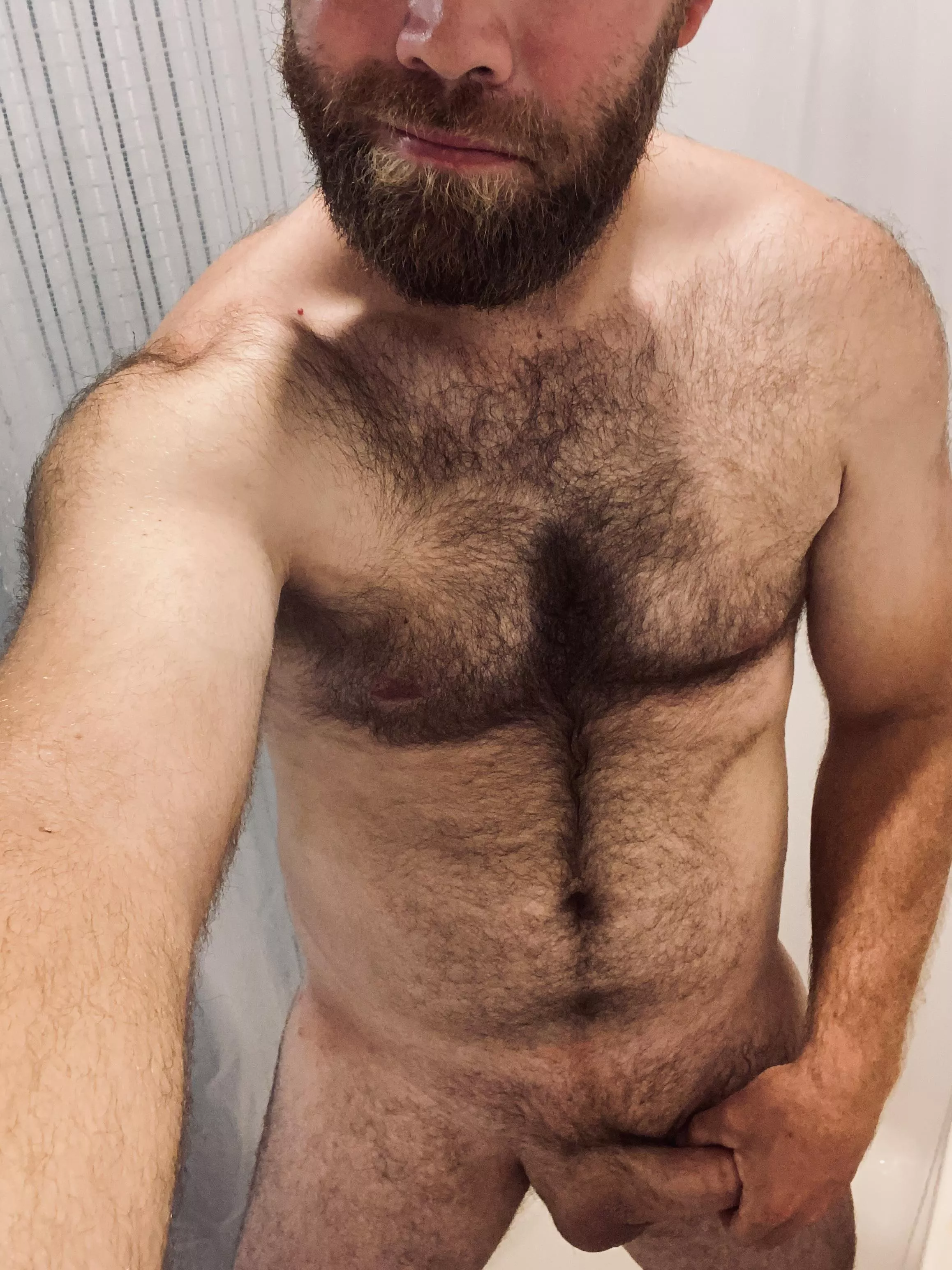 This shower has 2 shower heads…who wants to join this 6’5” dadbod?