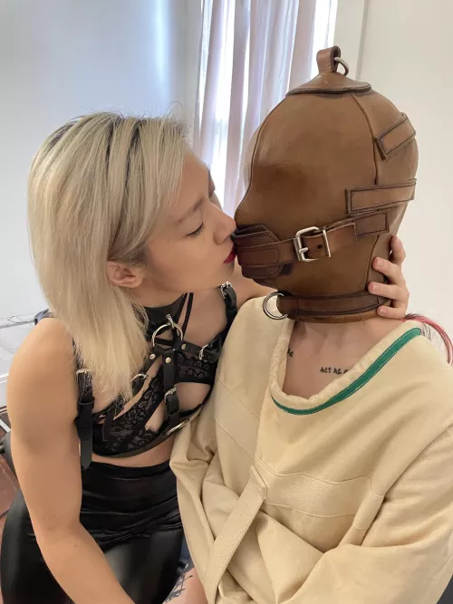 Feeling her kiss back on the inside of the mask is just so hot
