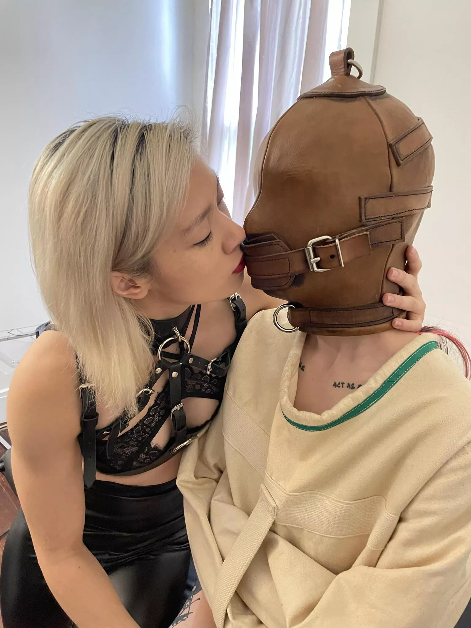 Feeling her kiss back on the inside of the mask is just so hot