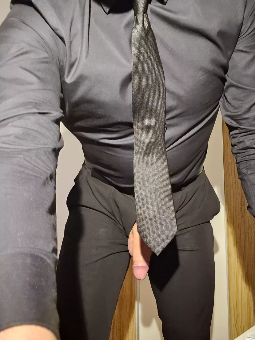 Is it still nudity if my tie covers my cock