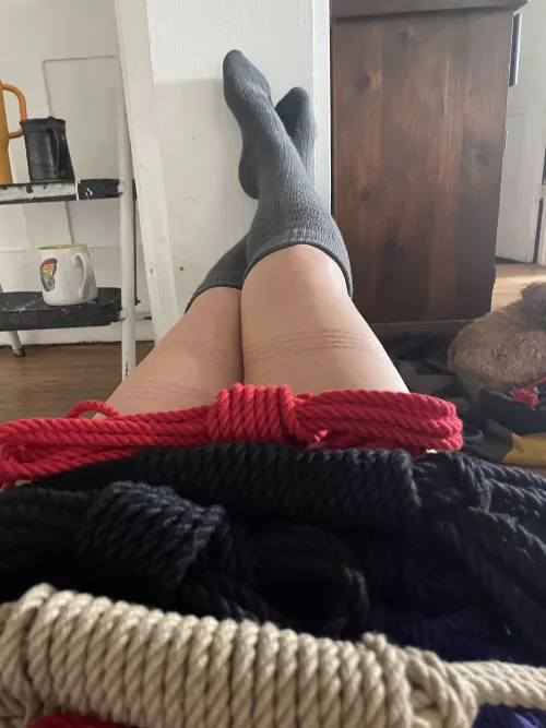 Basking in satisfaction and purring like a kitten with a ball of yarn.