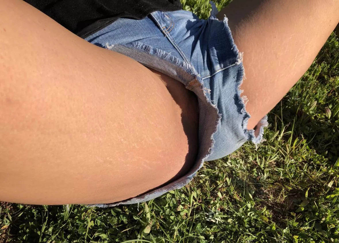 My wife teasing me trailside in the mountains.