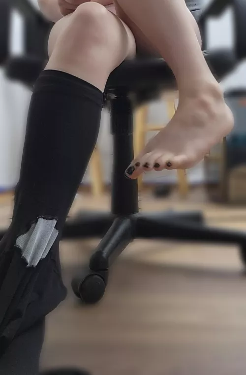 Taking my boots and stockings off after a long day