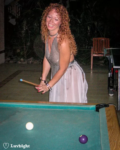 Dee Luvbight playing pool in Clejuso cuffs at the Hedo III rec center. October, 2004.