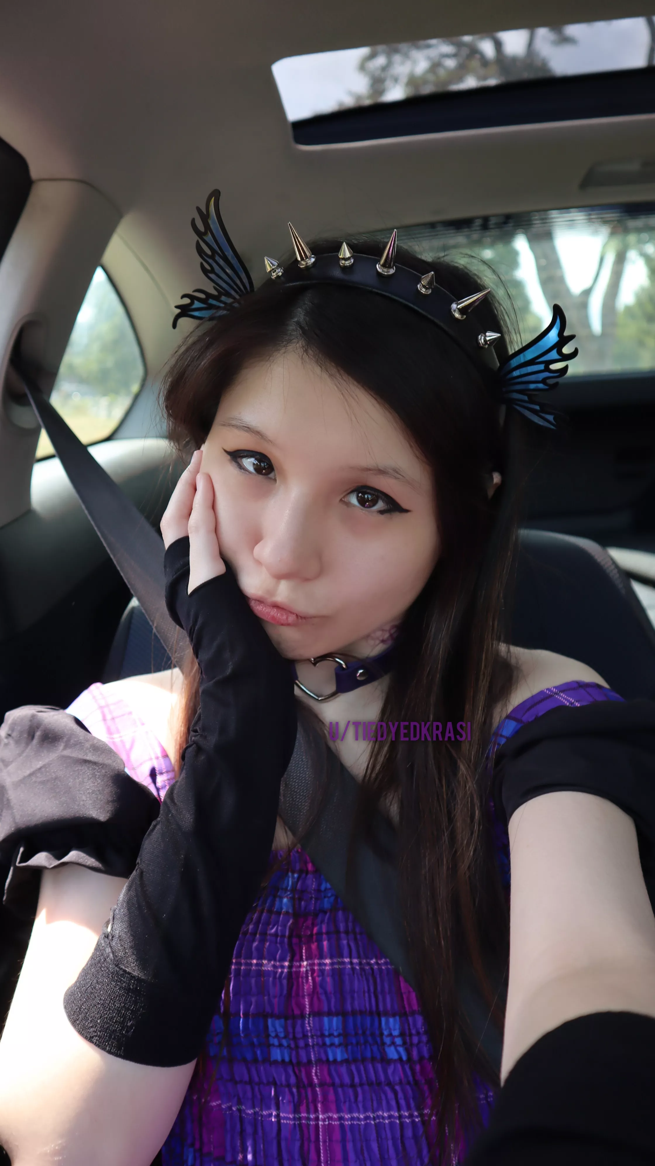 My face in the car at the cemetery