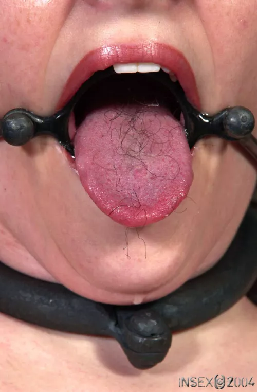 Pulling off her pubes and putting them in her gagged mouth will teach her the lesson.
