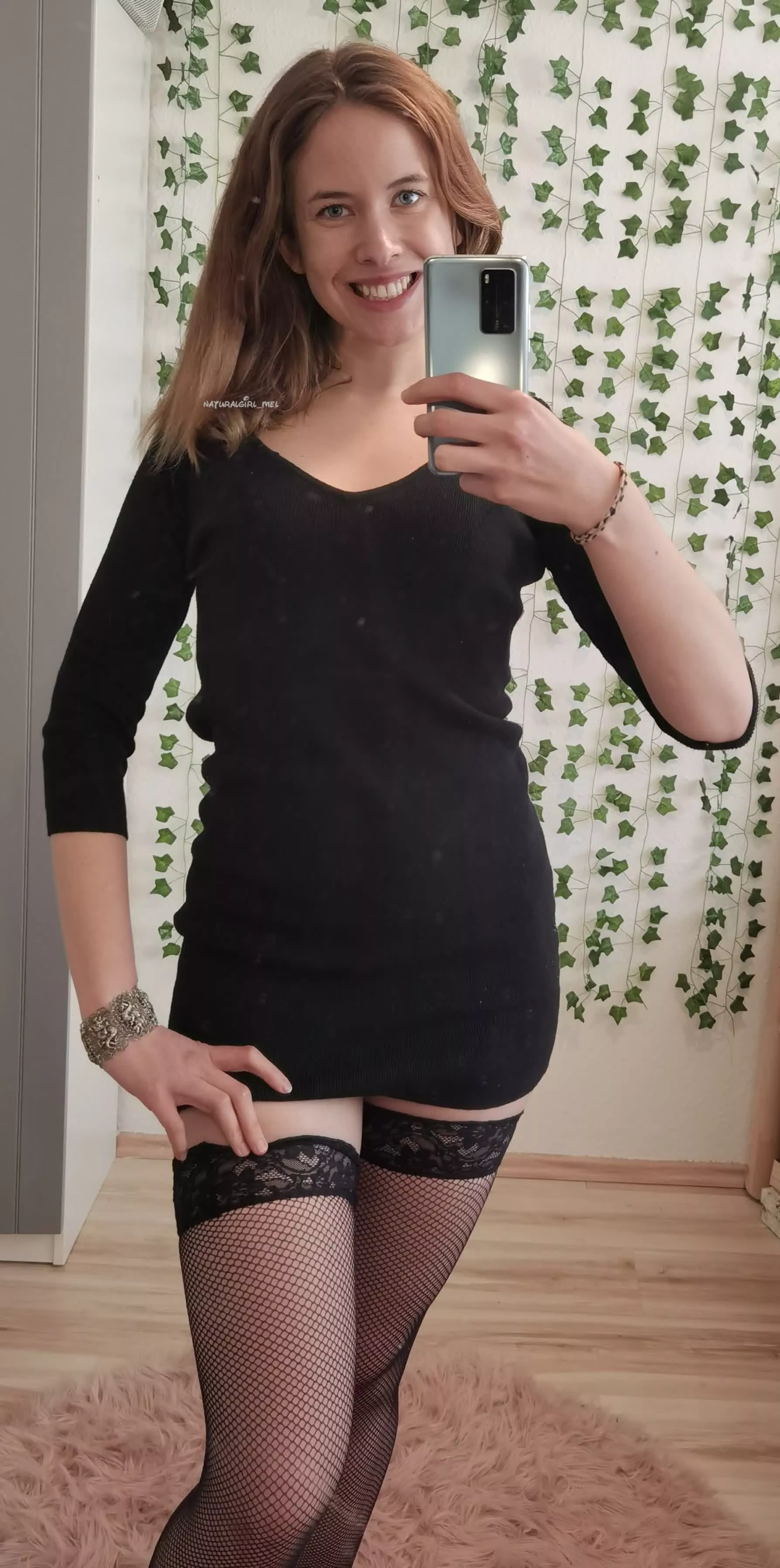 Black dress and fishnets thigh highs