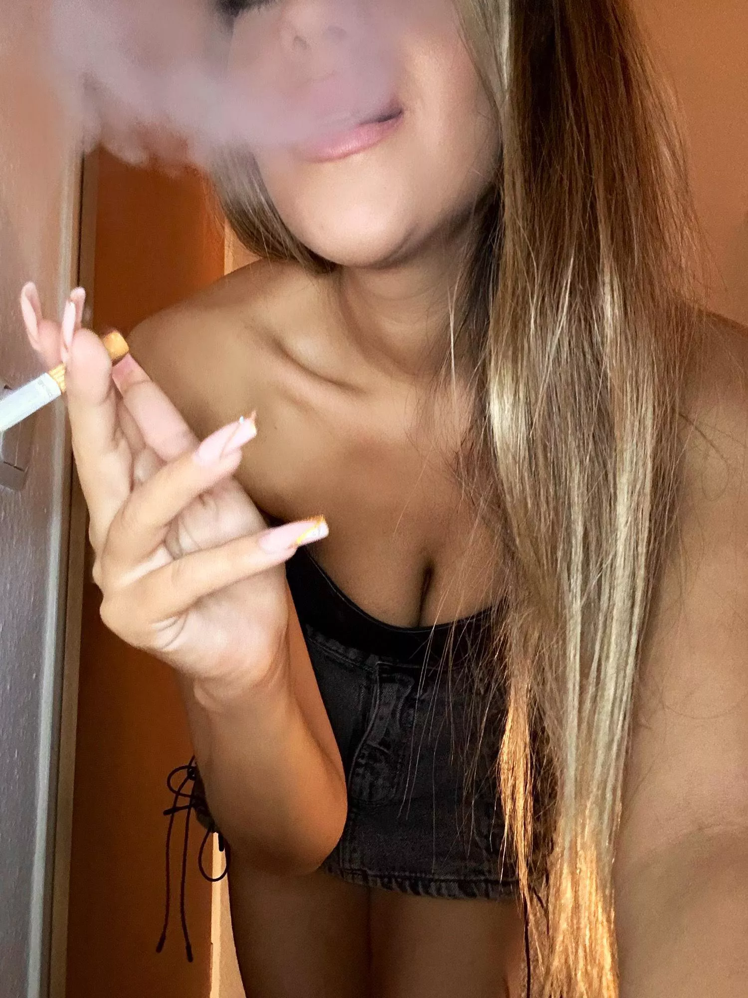 Blowing smoke in the air