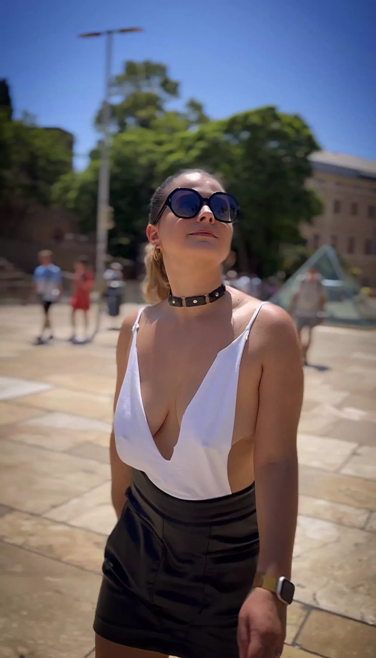 Enjoying the hot sun and a lose top