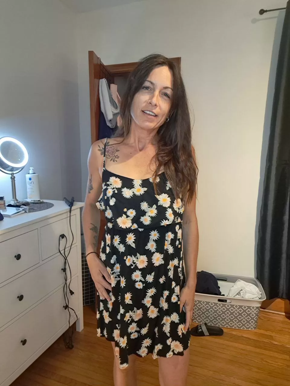 Dark hair, green eyes