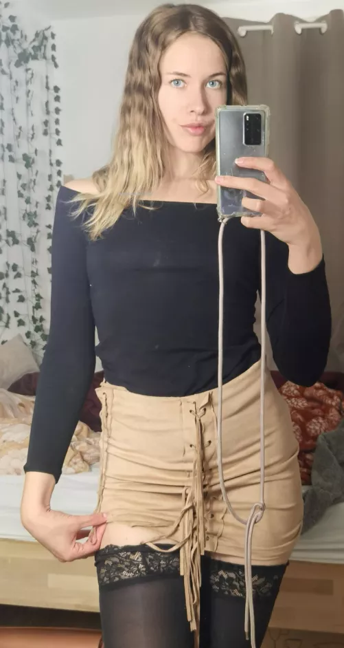 Miniskirt with black thigh highs