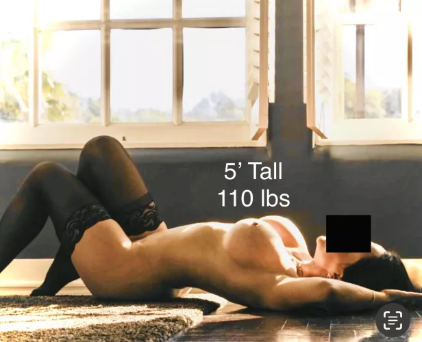 On her back, usually ends with her on her stomach!