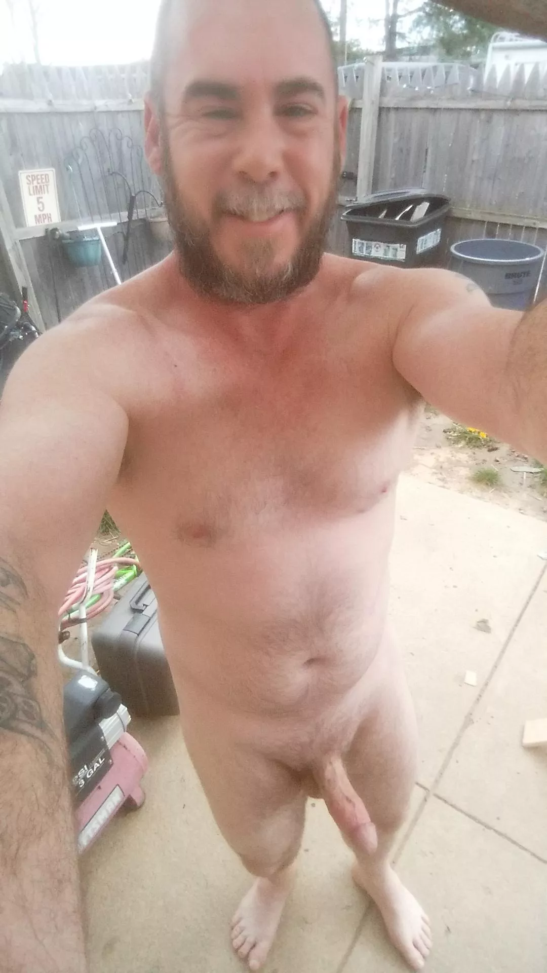 49 nude in the backyard