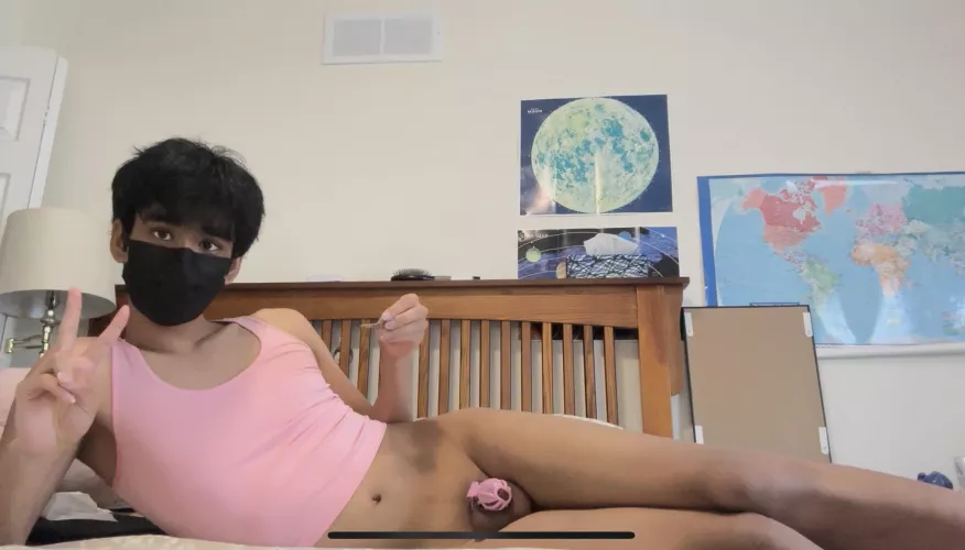 Locked boy lying in bed