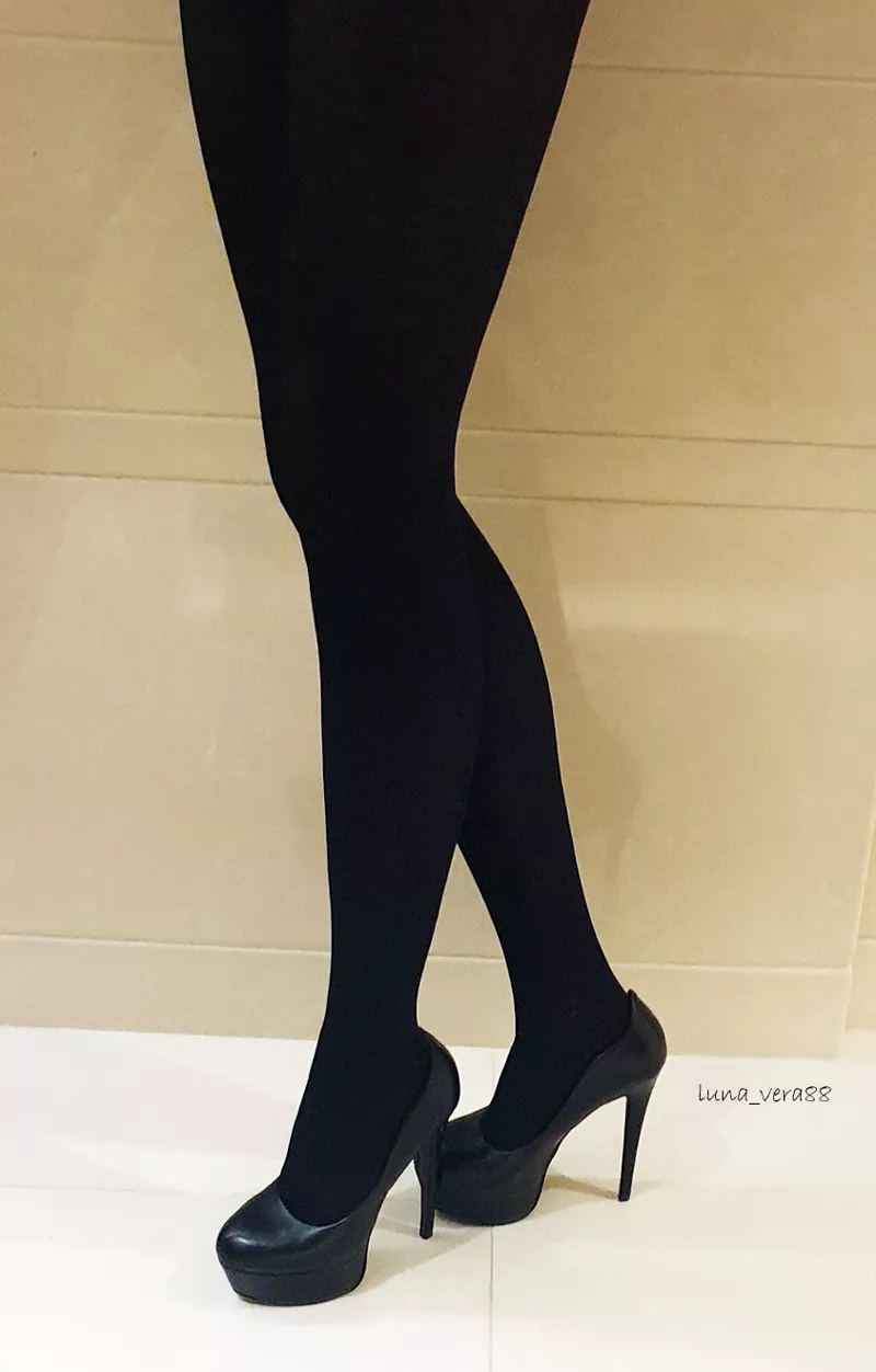 Another in the hotel with black heels&pantyhose, in front of the mirror... before wearing skirt and head out;)