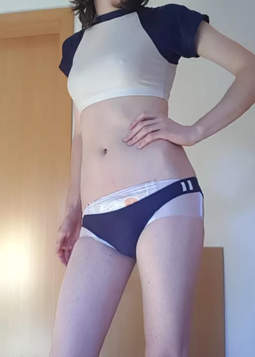 Daddy look! Thats the sports uniform I will wear when I start school soon 😊